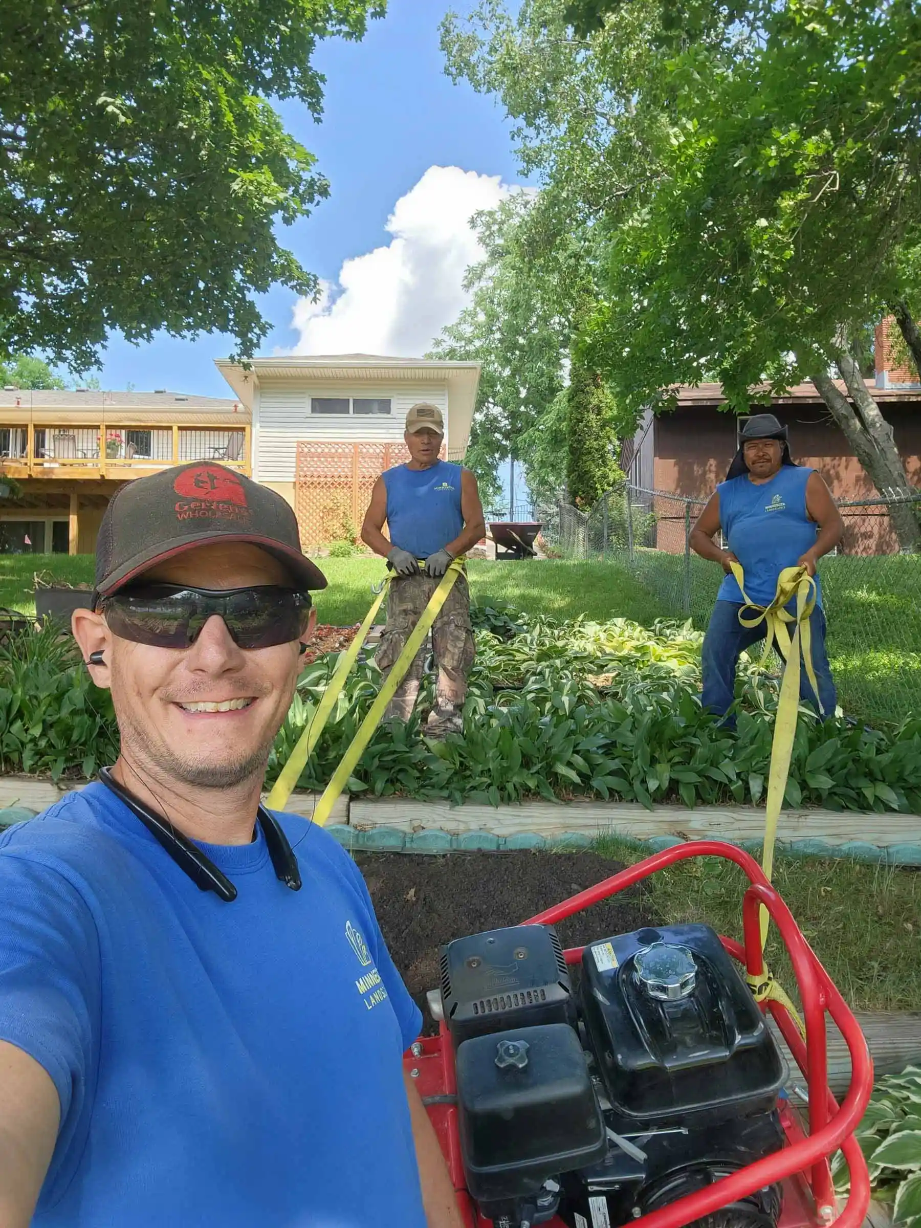 Certified arborist pruning a mature tree in fall