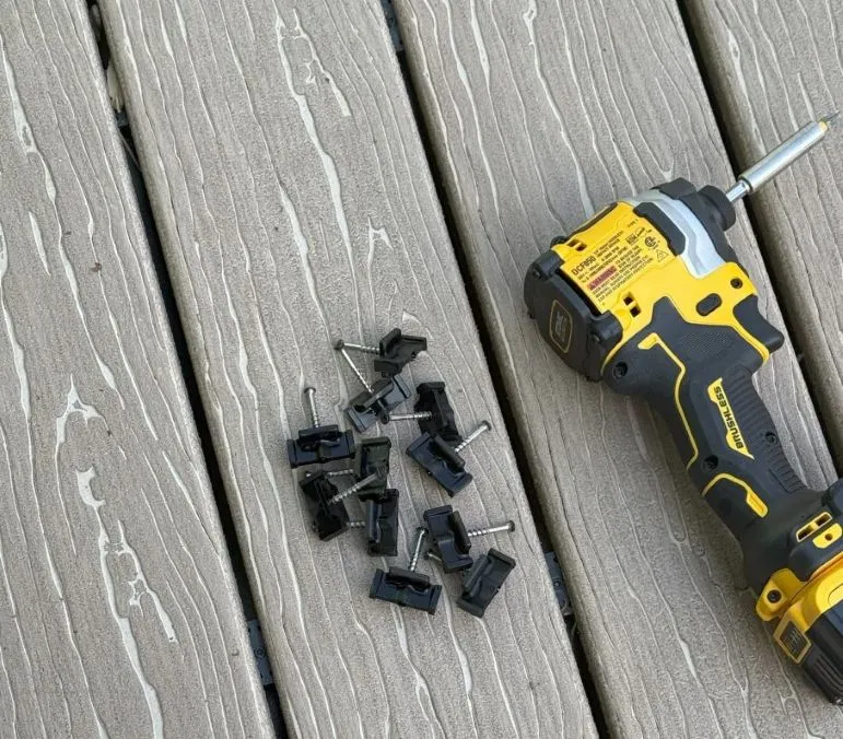 A custom deck addition made of wood built on the back of a North Georgia home in the woods