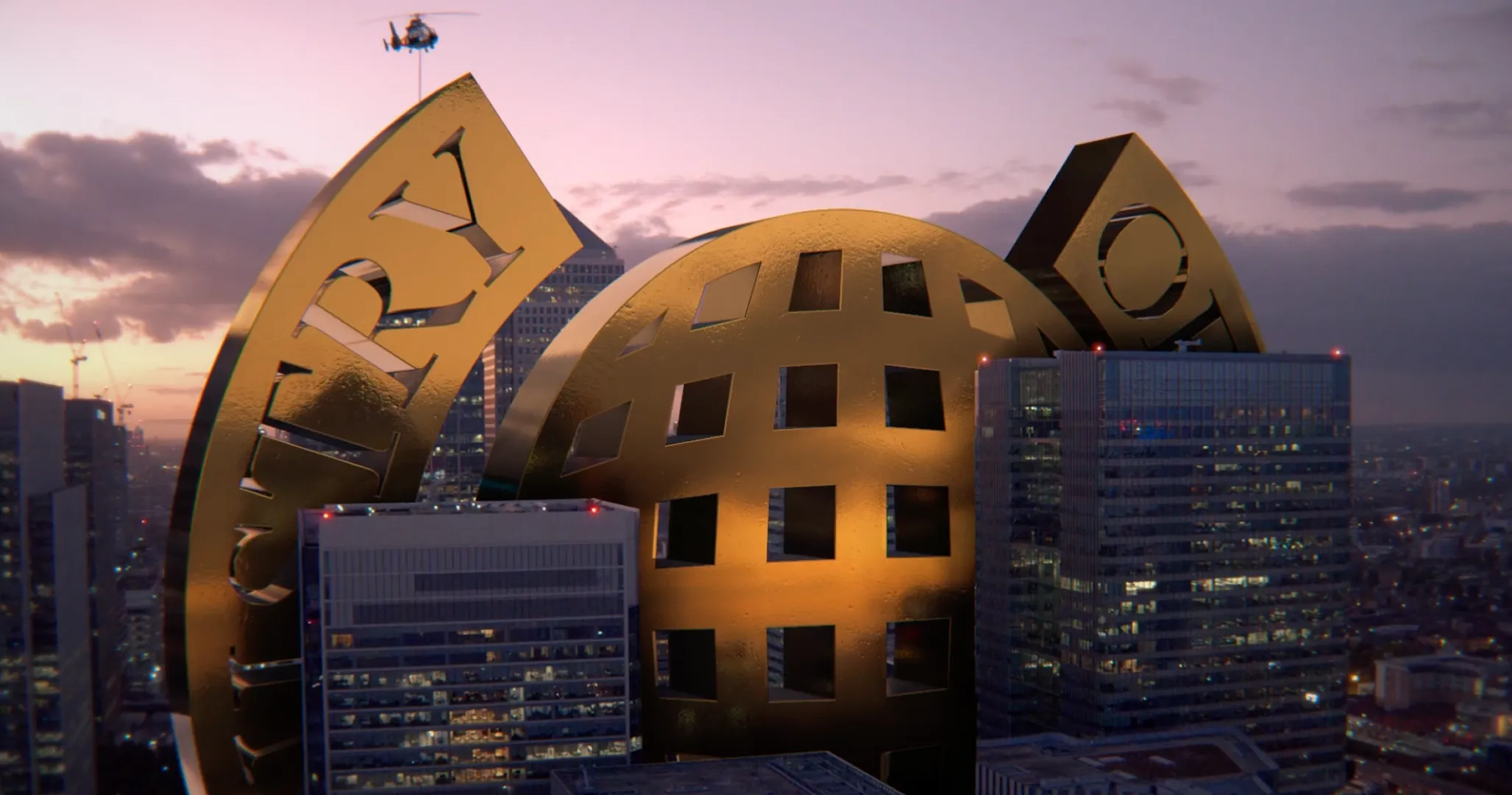 Large golden globe sculpture with cutout windows and partial letters, situated among urban skyscrapers at dusk with a helicopter flying overhead.
