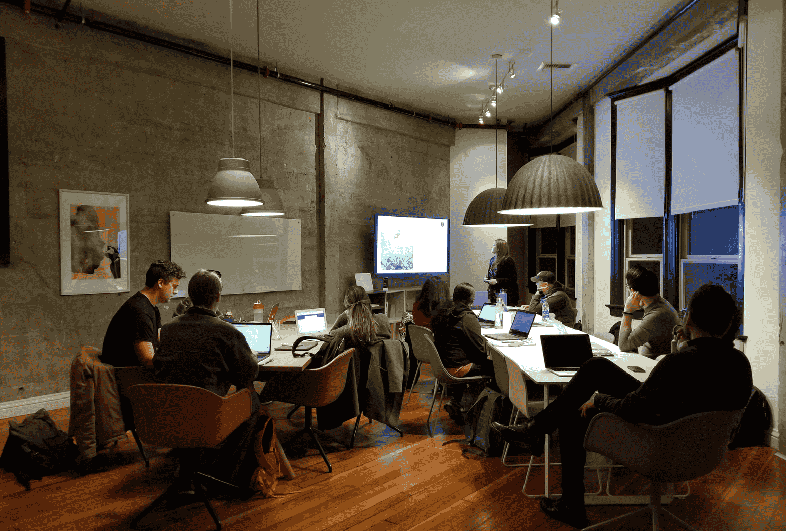 Diverse students learning tech skills together