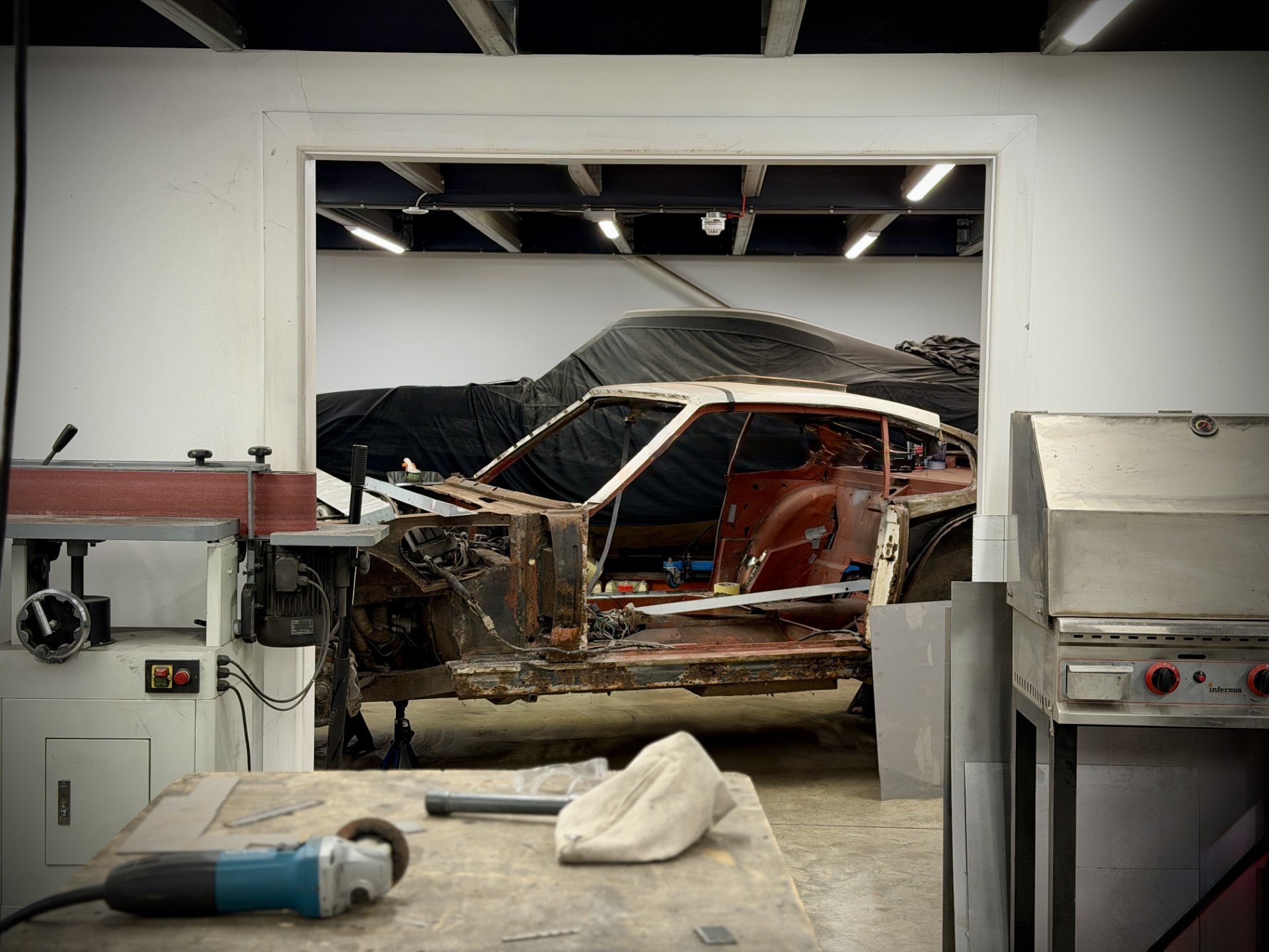 Engineers working on an Aston Martin at Vantage Engineering.
