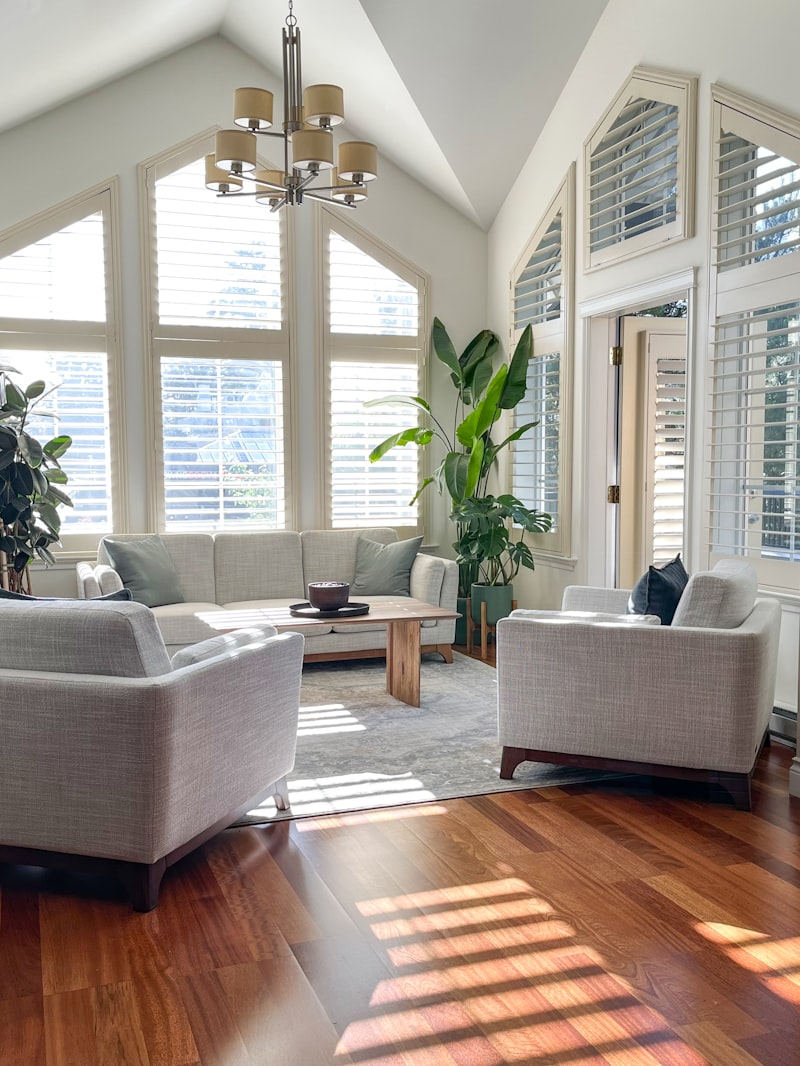 A bright living room with a large window letting in clear morning light