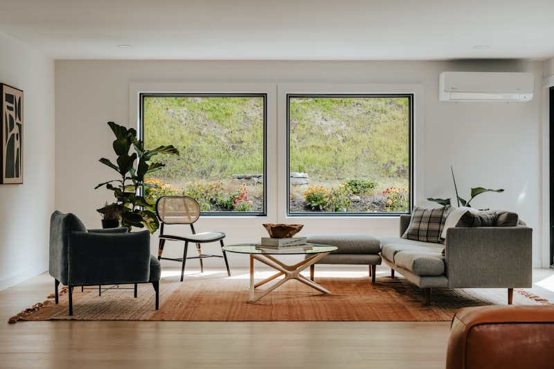 Bright, airy Singapore living room with large windows and soft natural light
