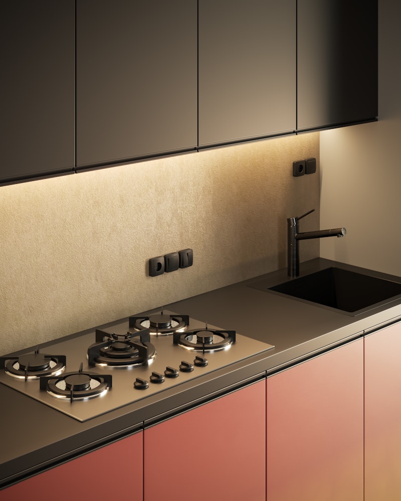 A bright Singapore kitchen with a gas stovetop and sink