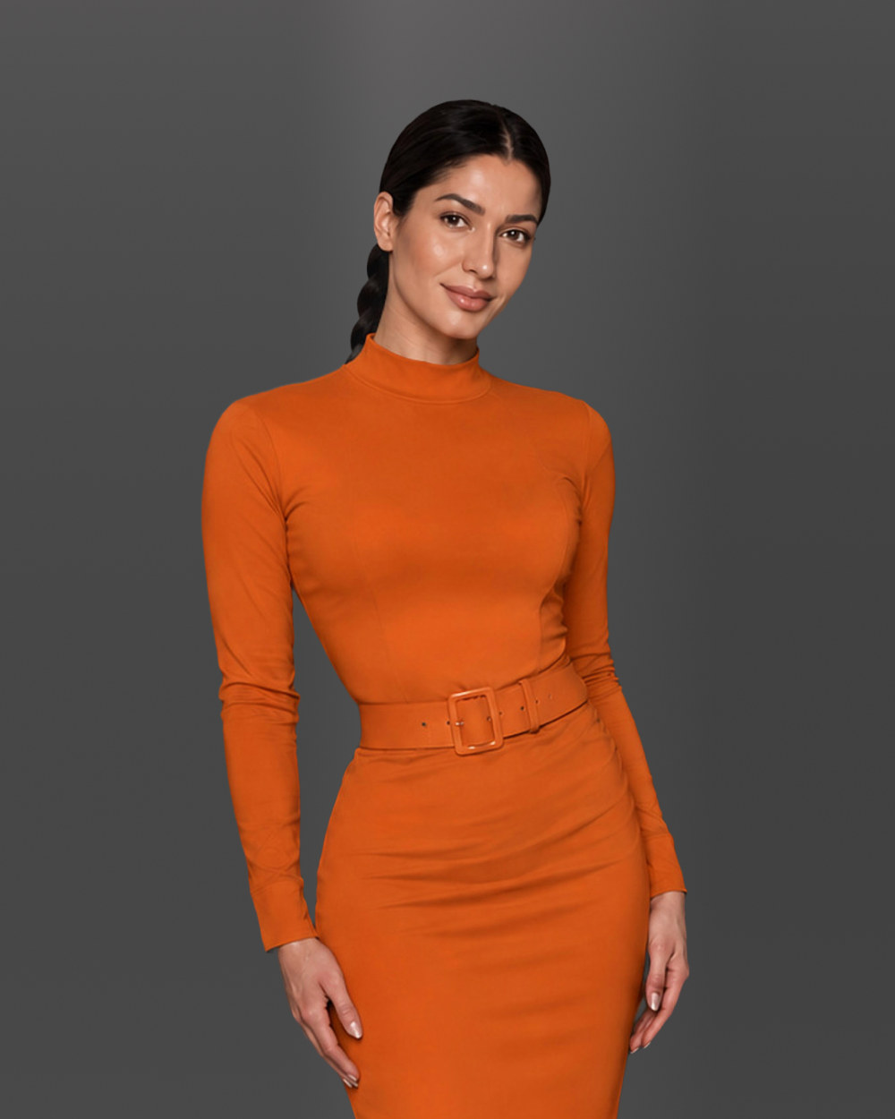 Professional in an orange dress on a grey background