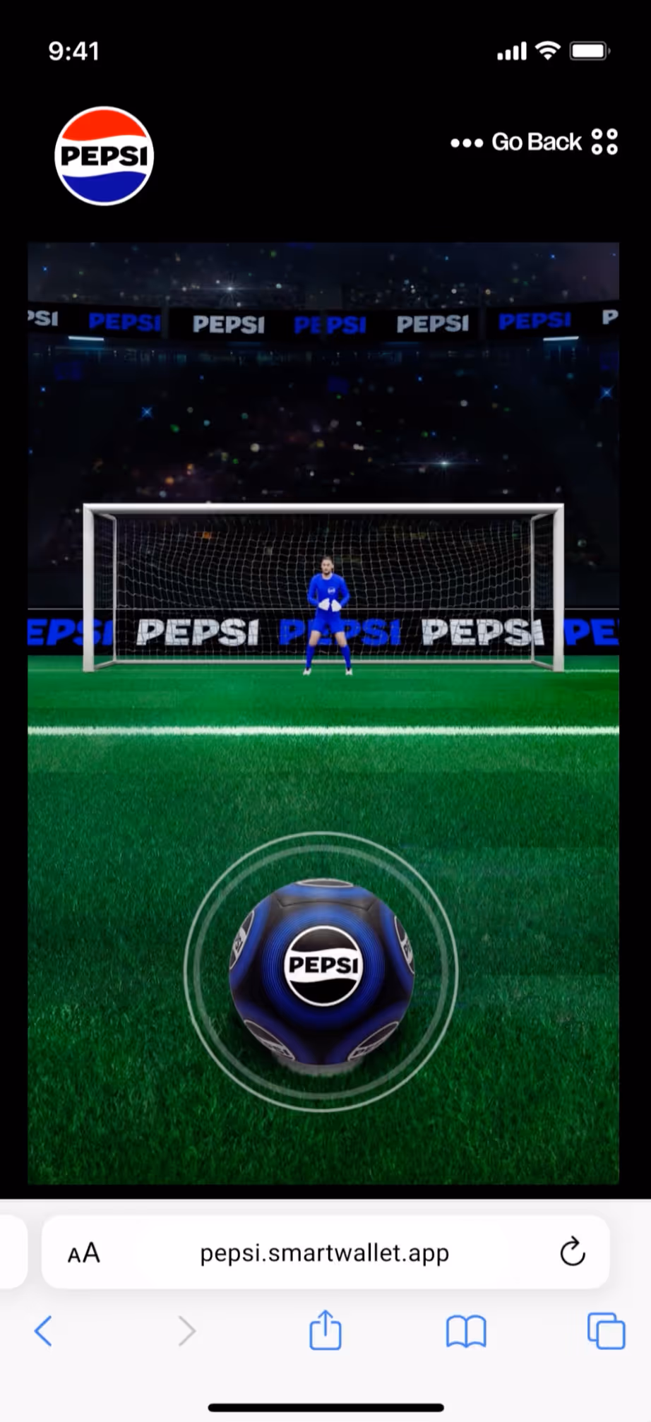 Mobile screen showing a Pepsi-branded virtual soccer penalty kick game with a goalkeeper in blue, a Pepsi soccer ball on the field, and Pepsi advertising around the goal.