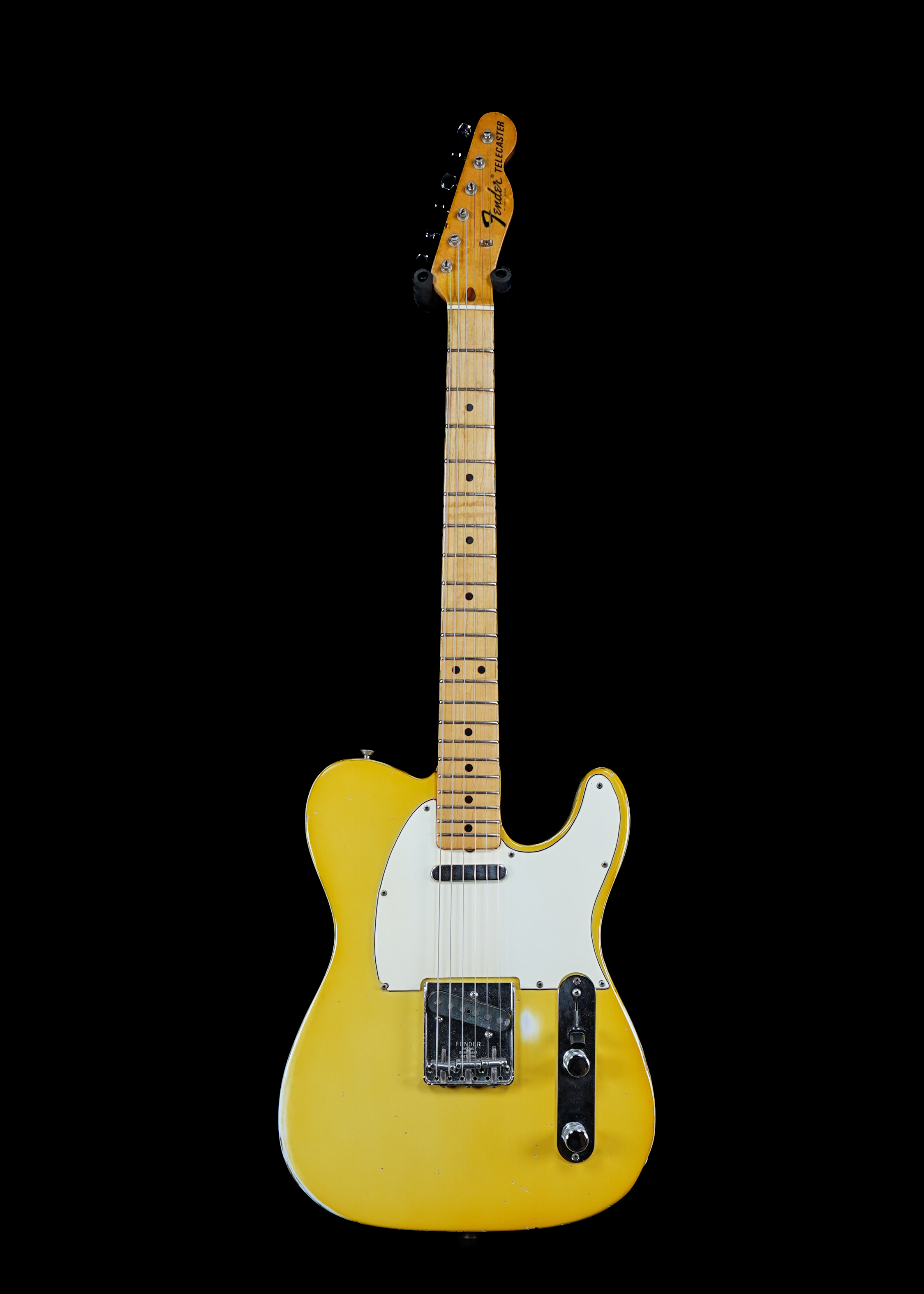 a professional of a 1969 Fender Telecaster Olympic White vintage electric guitar by Tone Brothers, the best place to sell my vintage Fender guitar