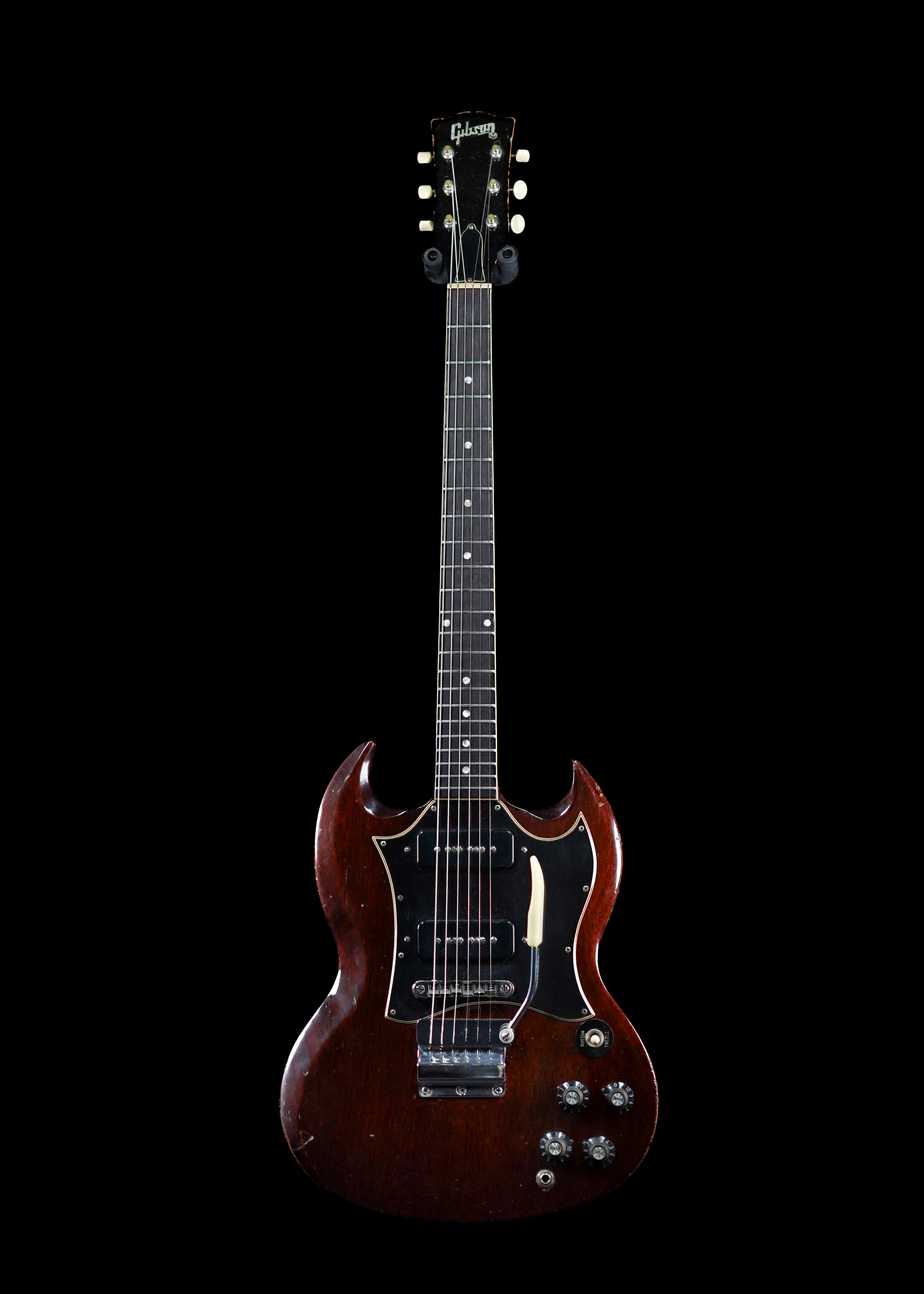a professional photo of a 1969 Gibson SG Special Cherry vintage Norlin-Era guitar by Tone Brothers, the best place to sell my vintage guitar