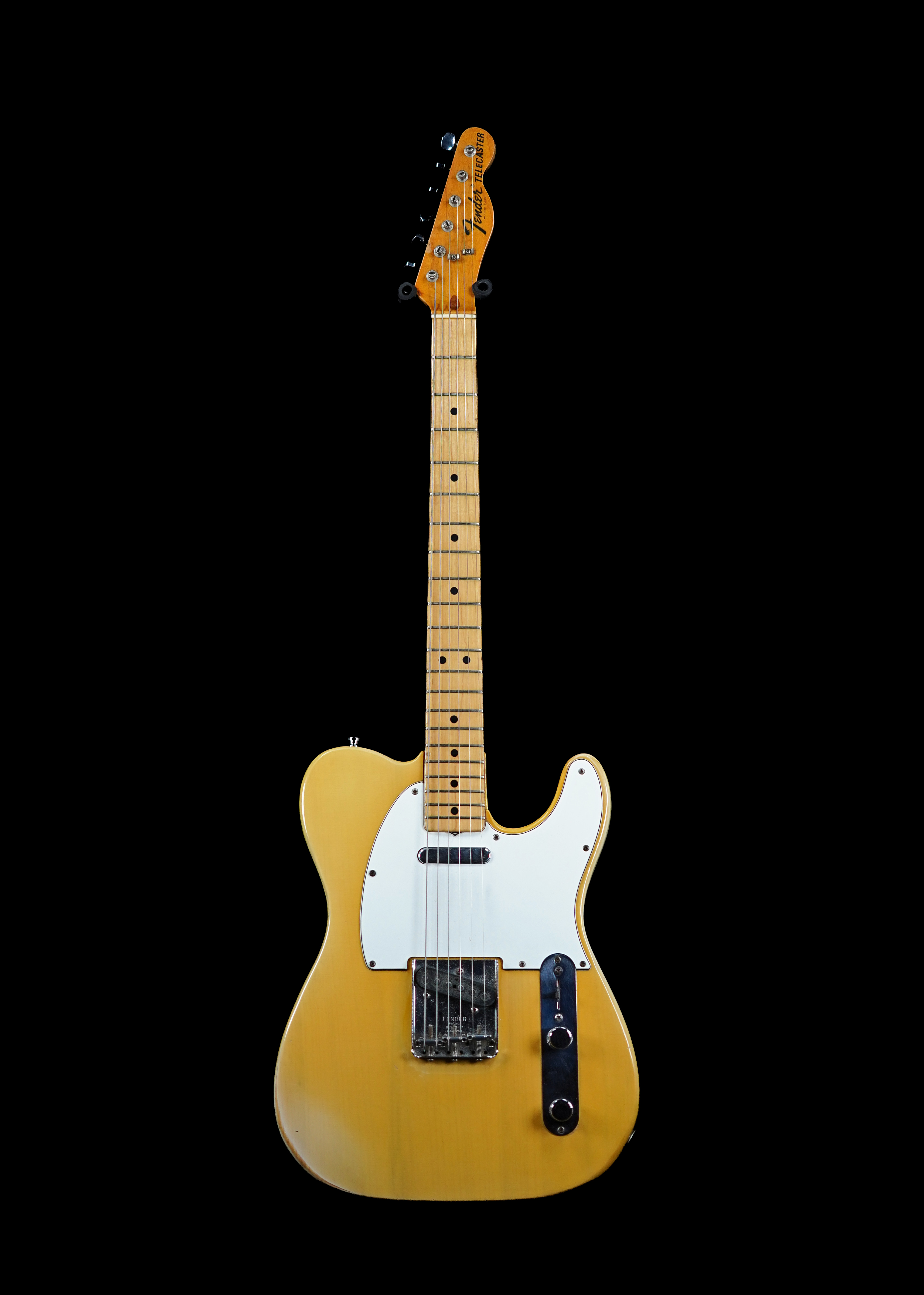 a professional photo of a 1974 Fender Telecaster Blonde 2858 by Tone Brothers
