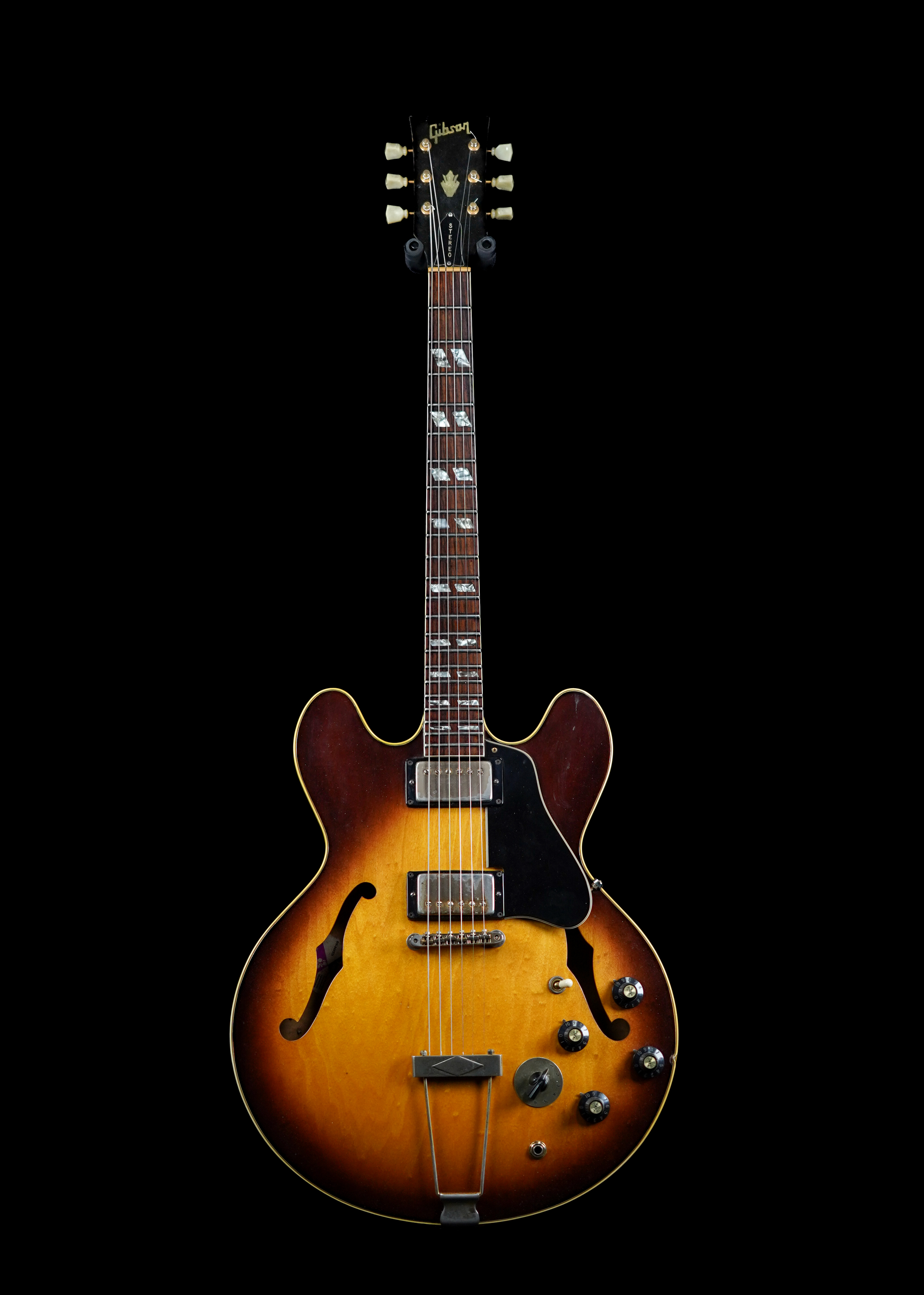 a professional photo of a 1971 Gibson ES-345 Sunburst by Tone Brothers