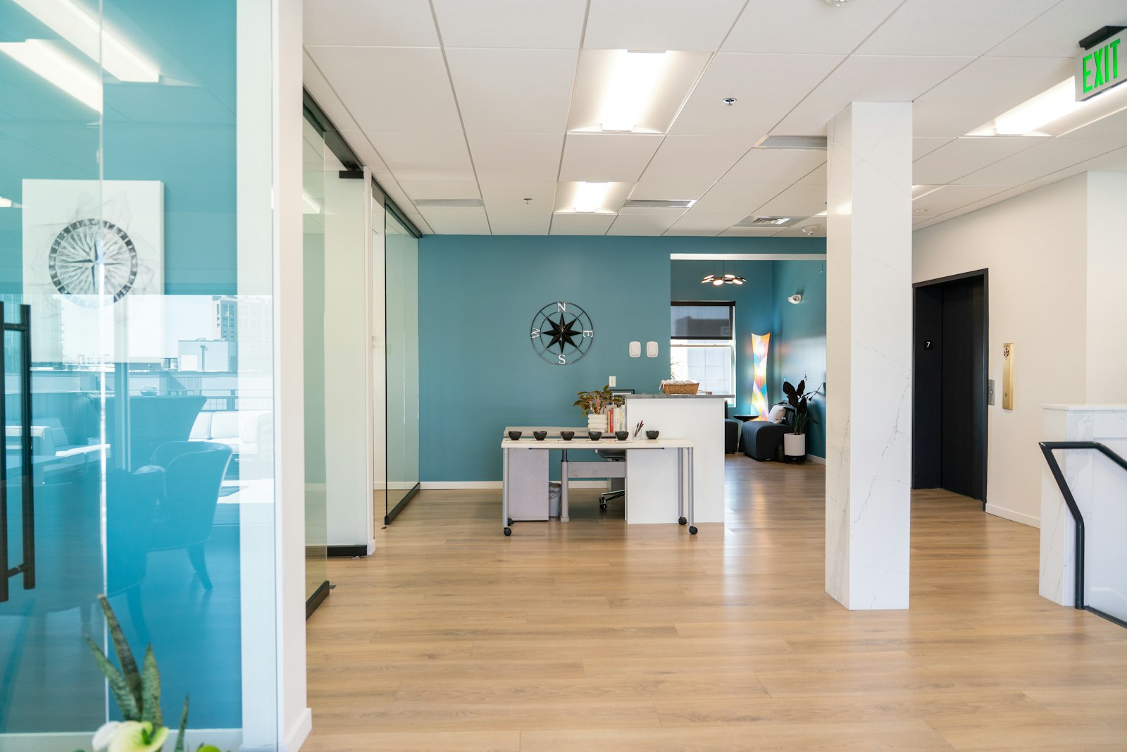 A bright and modern office interior is shown.