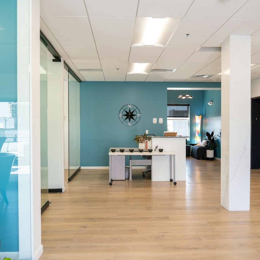 A bright and modern office interior is shown.