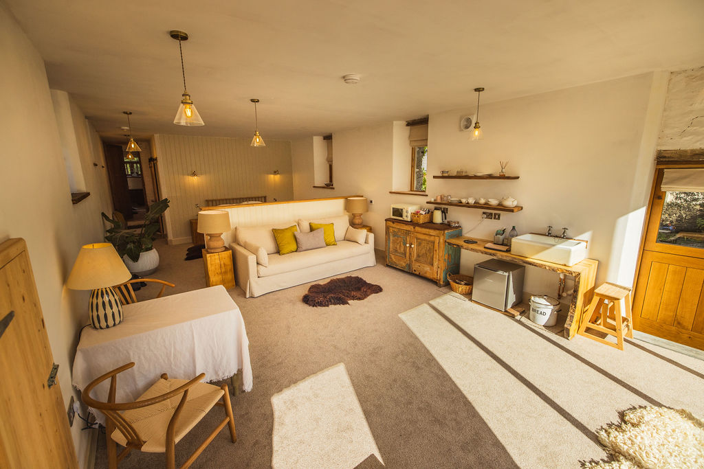 The Shippon — view across the bedroom to the courtyard window, Borough Farm