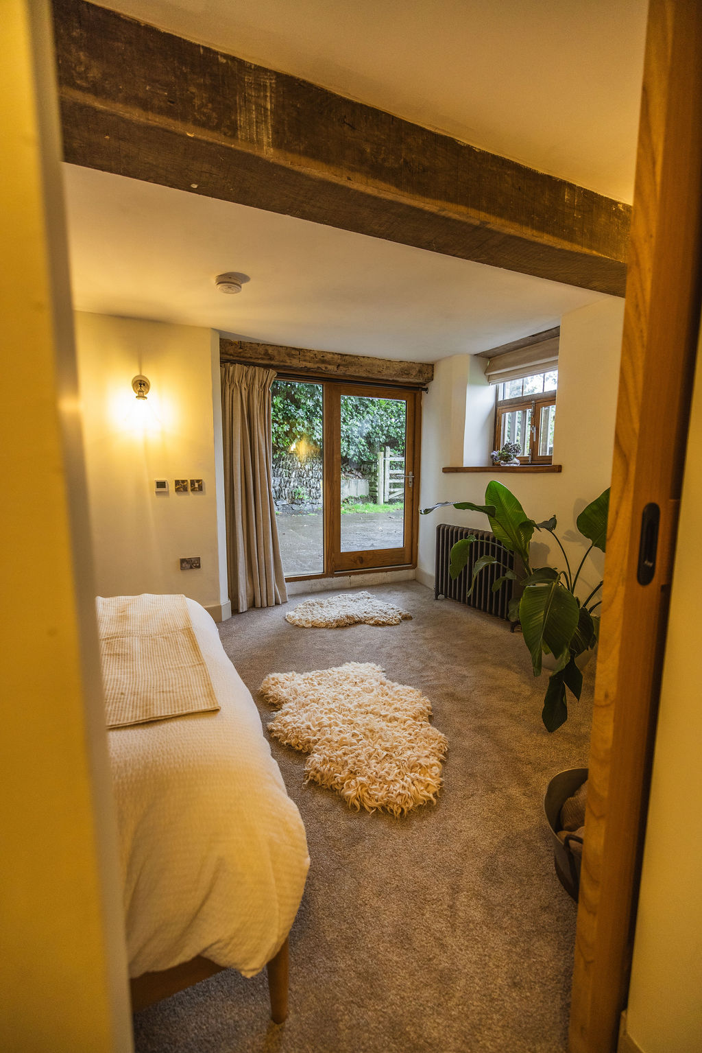 Inside The Dairy barn suite at Borough Farm, Devon