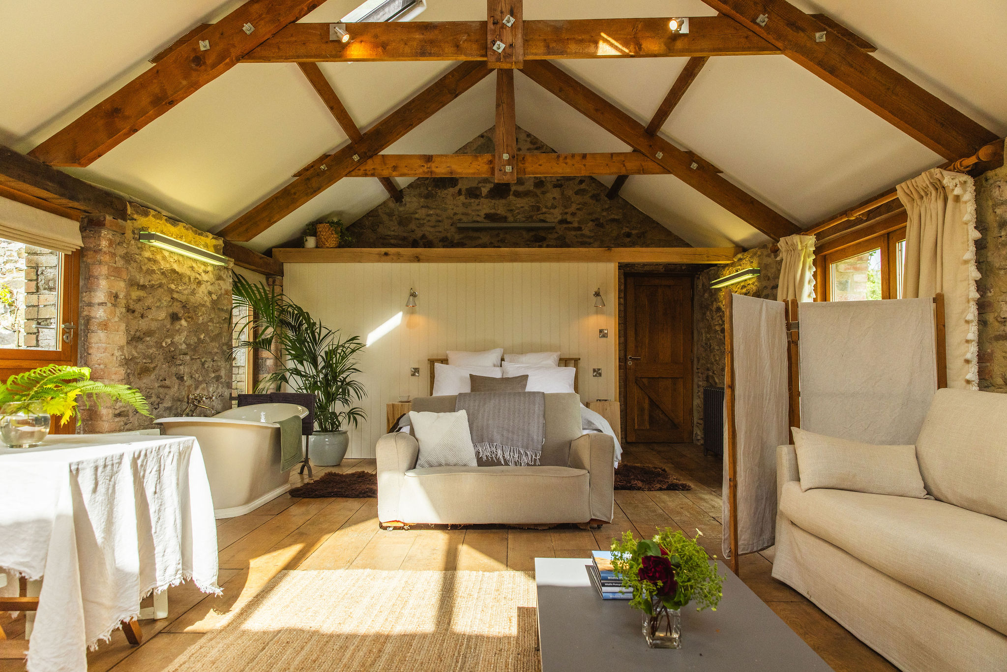 The Yard — open-plan barn studio at Borough Farm, Devon