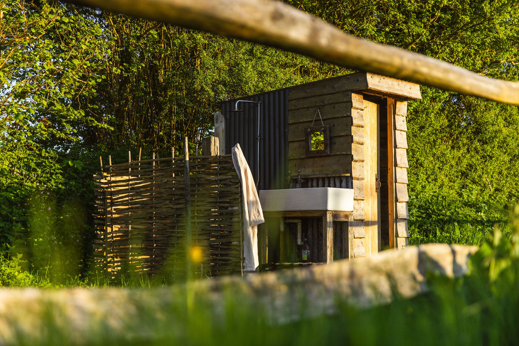 Great Links yurt in its paddock at Borough Farm, Devon