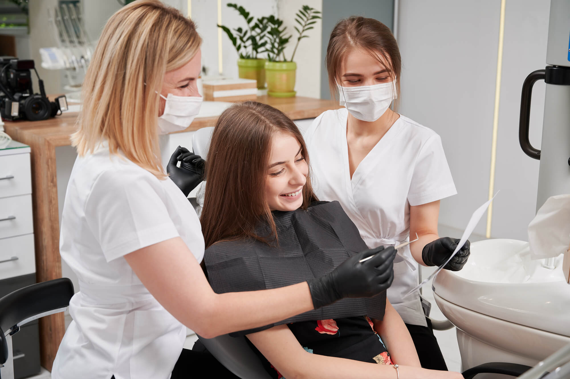 Prosthodontist Pompano Beach teaching patient dental hygiene