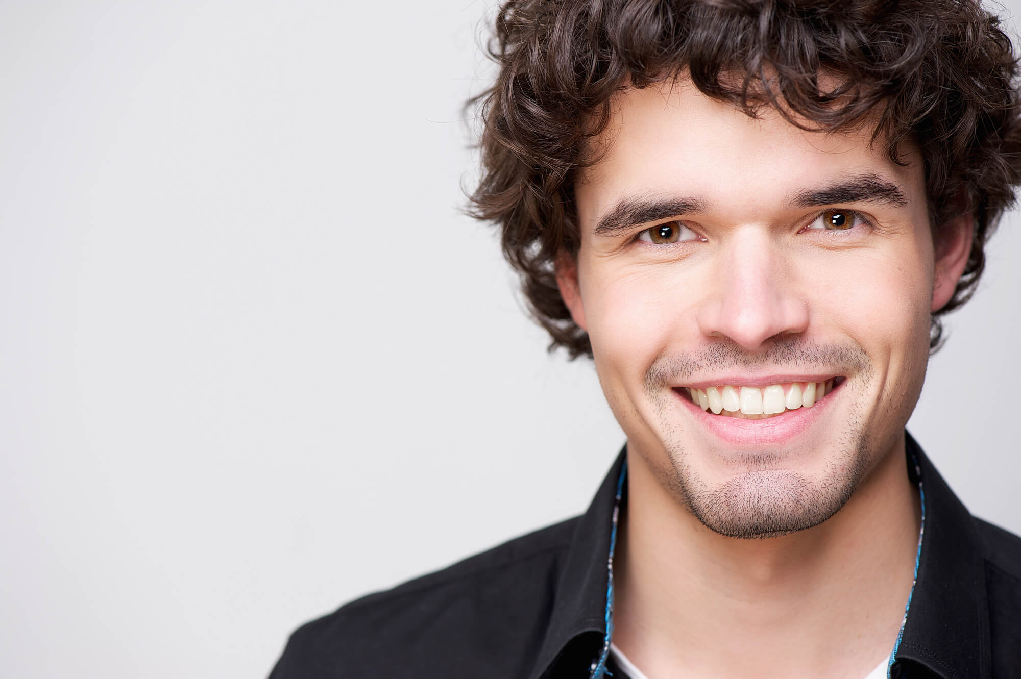 man smiling after visiting his Cosmetic Dentist Pompano Beach