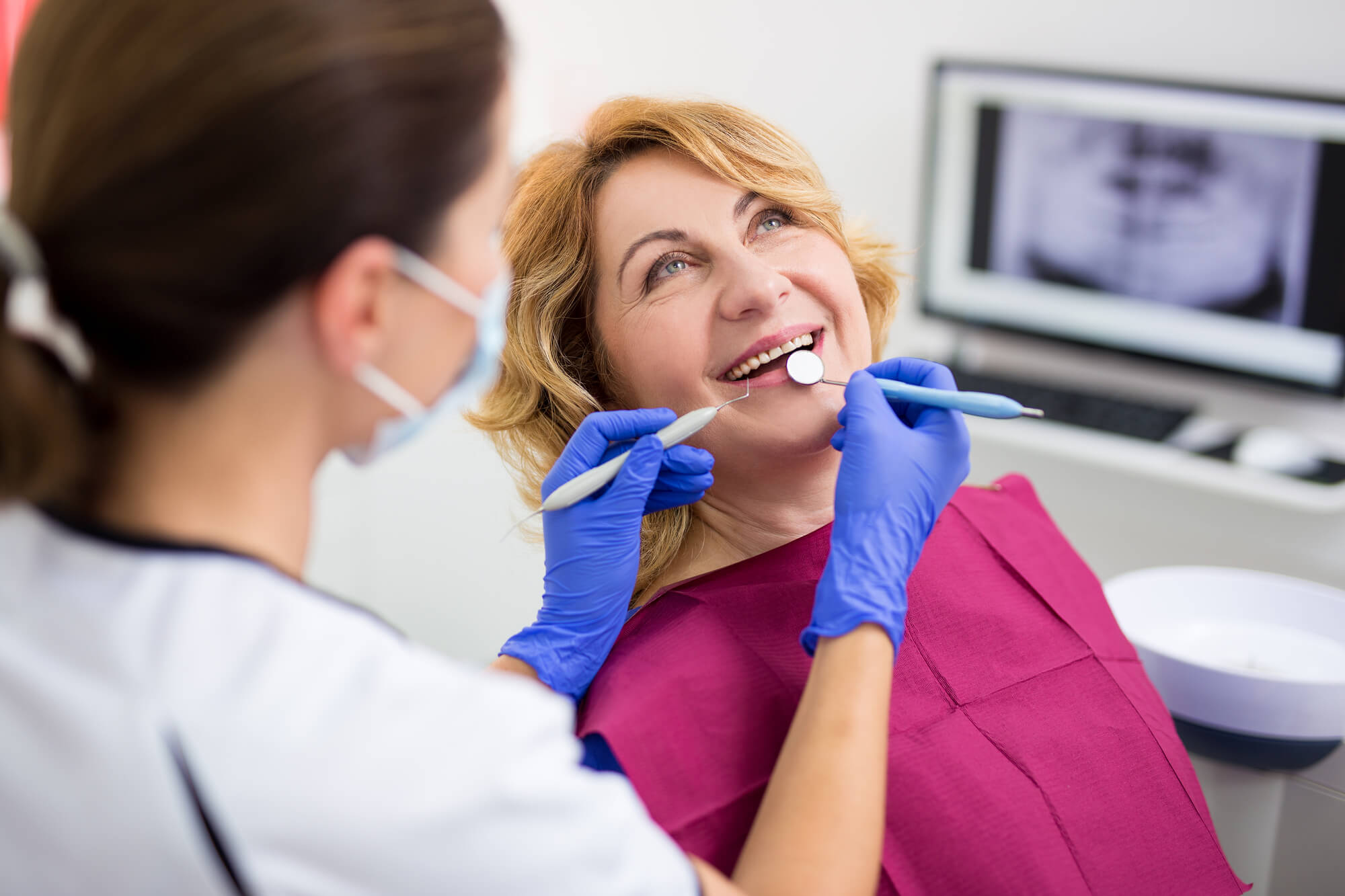 a woman with Dentures in Pompano Beach