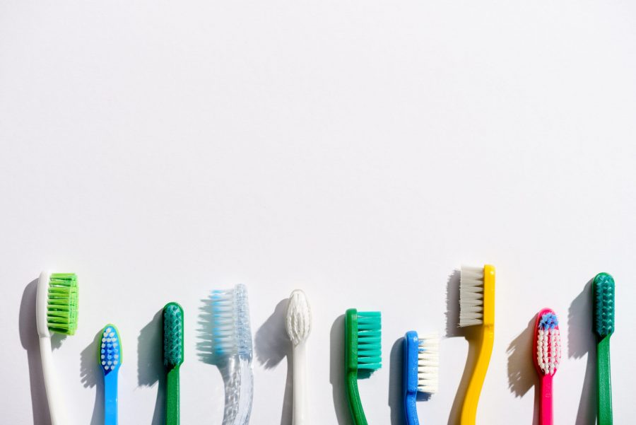toothbrushes in a row