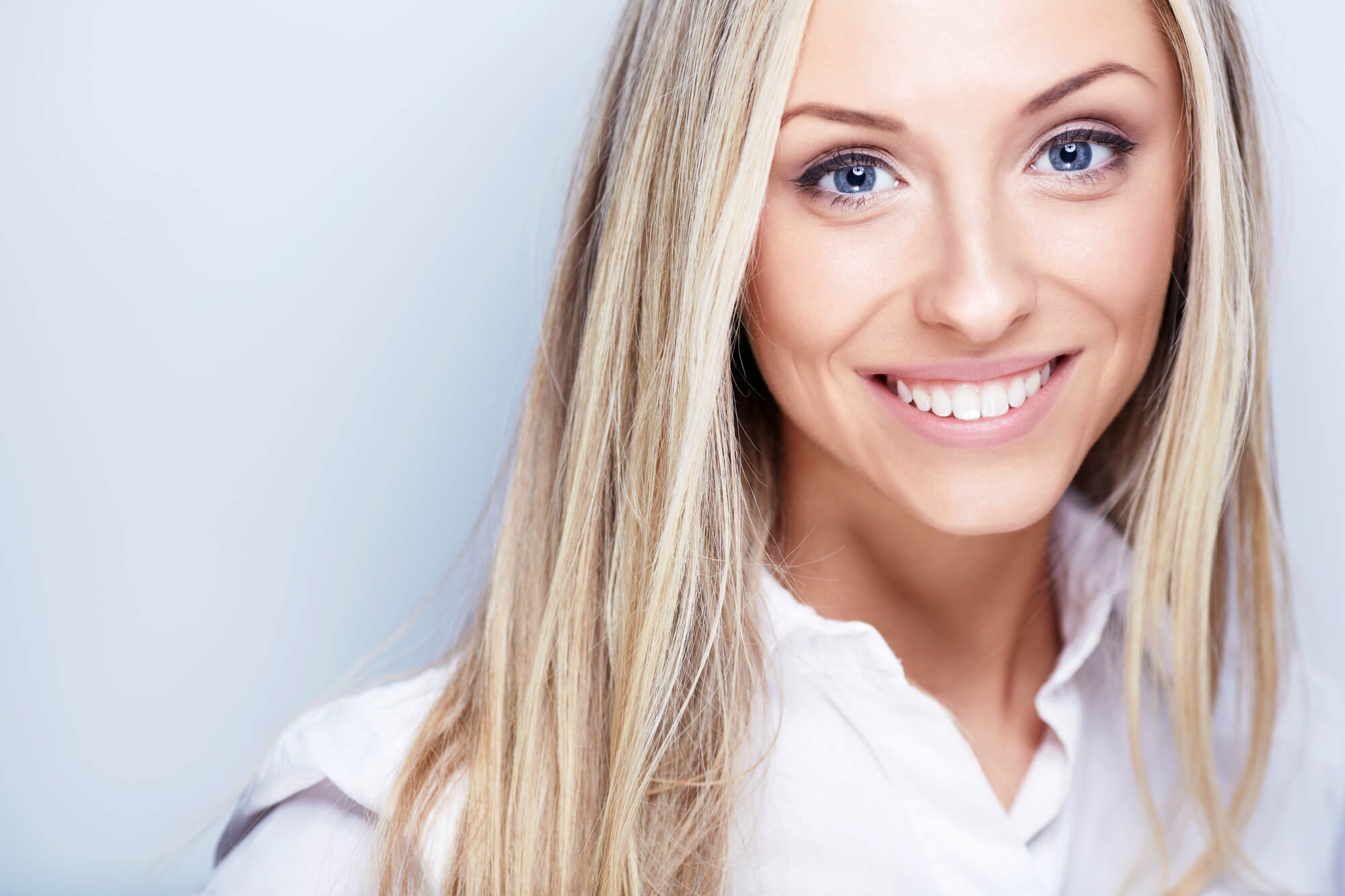 woman happy after her root canal in Pompano Beach