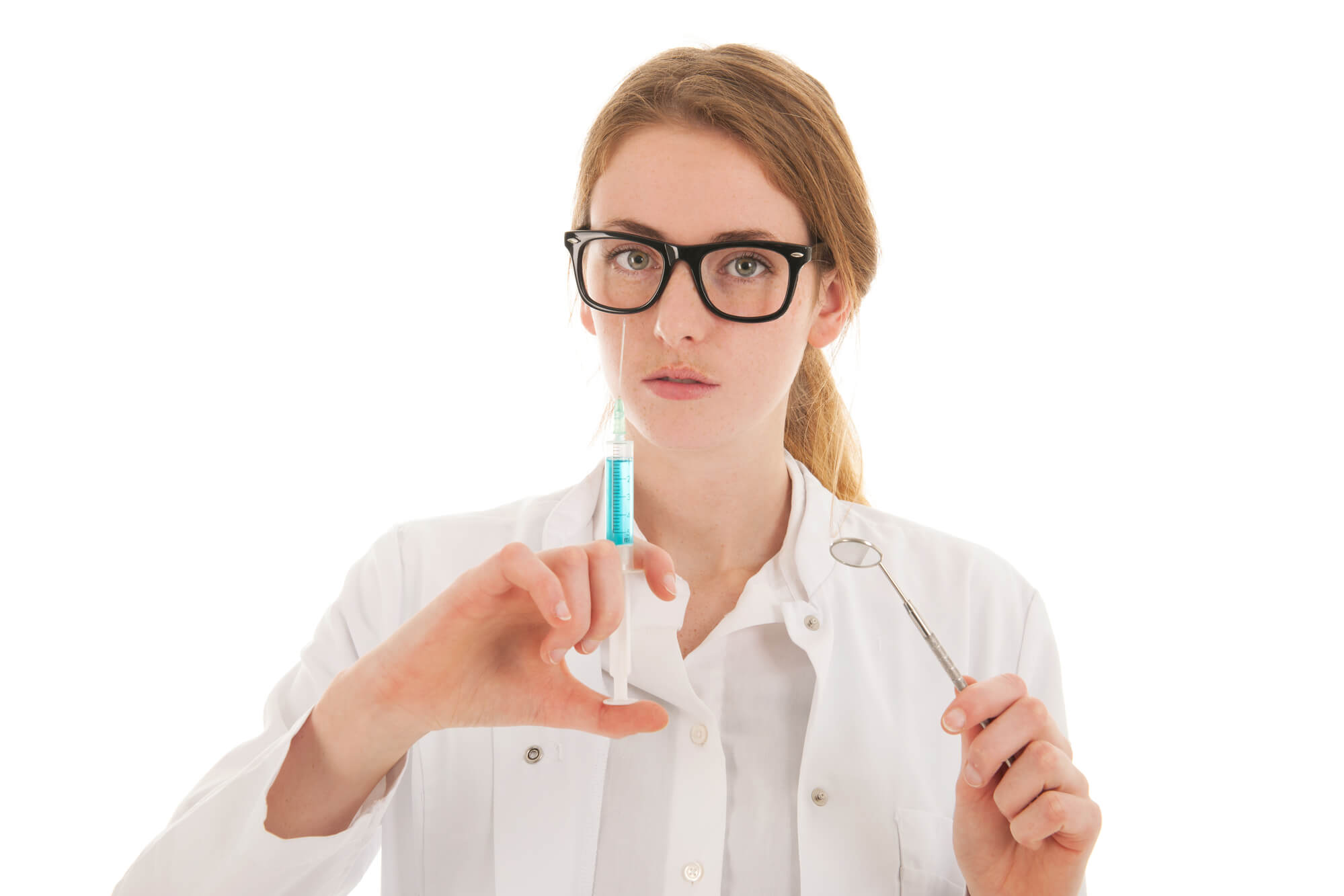 dentist holding a syringe used for Sedation Dentistry in Pompano Beach