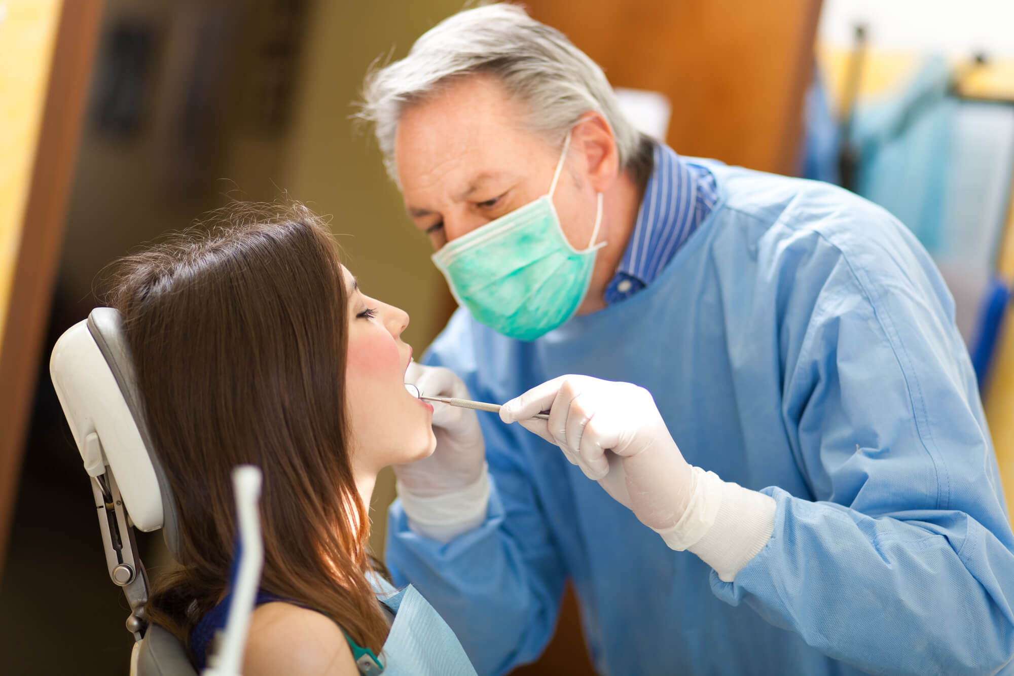 a Periodontist in Pompano Beach with a patient