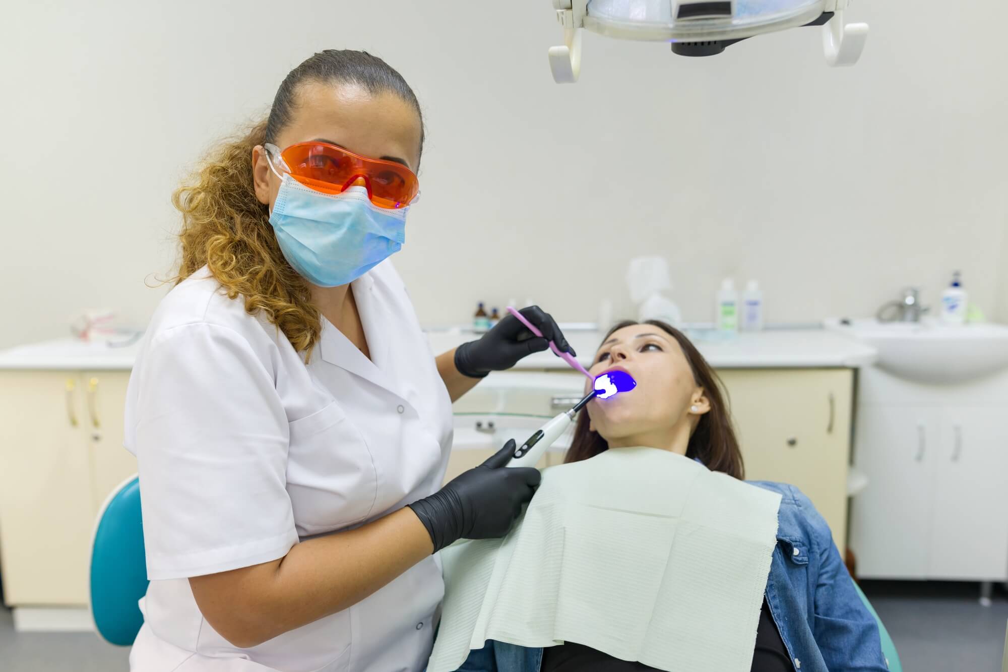 dentist treating patient after administering Sedation Dentistry in Pompano Beach