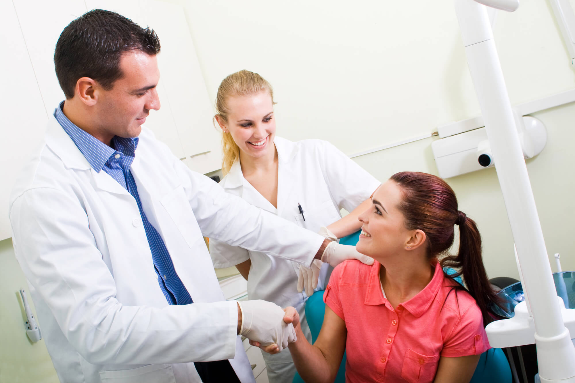 a Cosmetic Dentist in Pompano Beach greeting patient