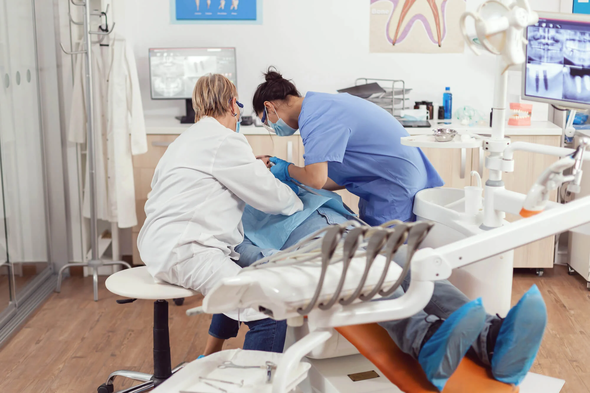 Oral surgery procedure in modern clinic oral surgeon in Pompano Beach Airpark.