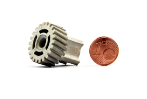 An example of a gear smaller than a 1-ct coin.