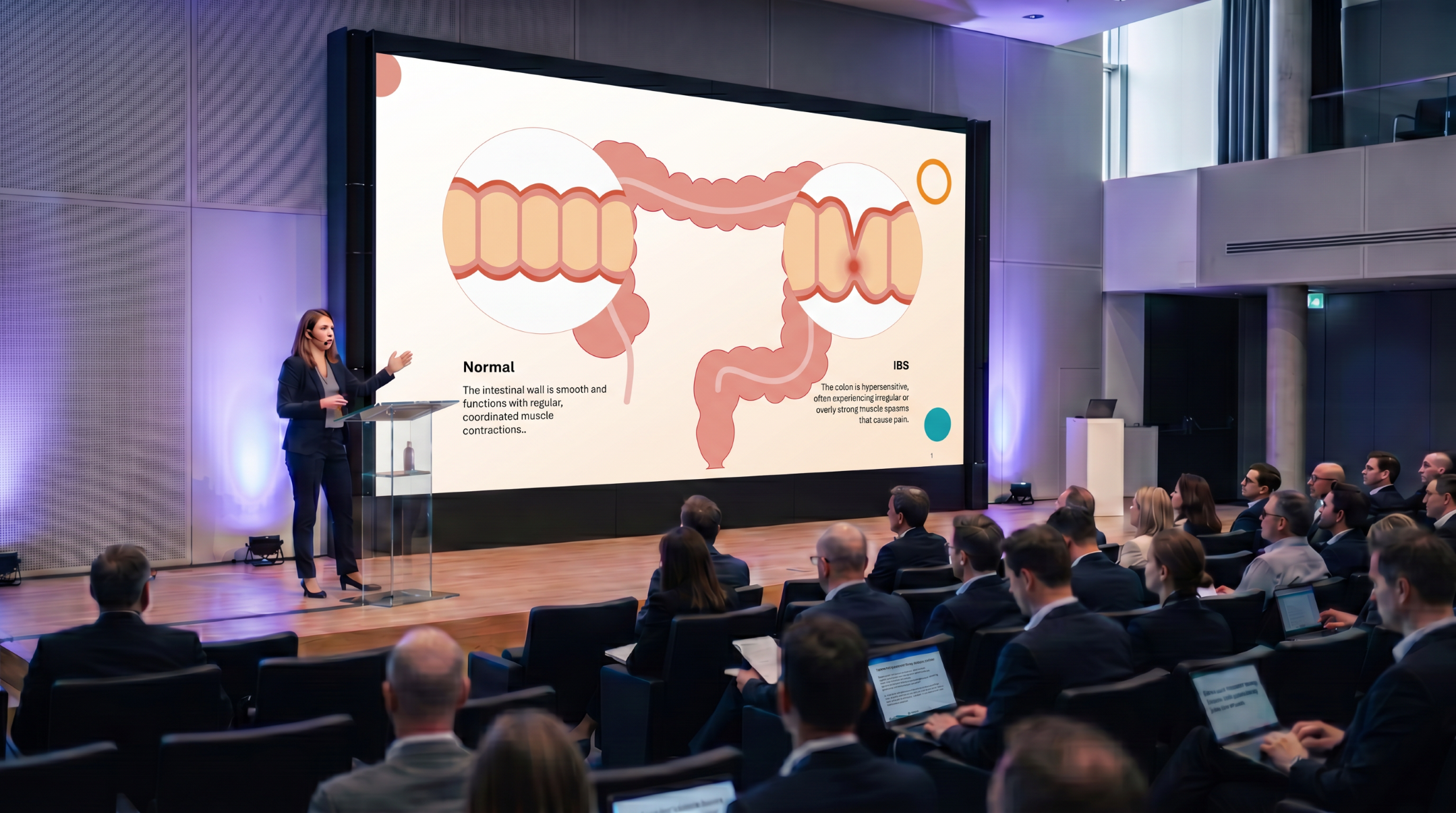 Medical presenter explaining the differences between a normal colon and irritable bowel syndrome using an editable IBS PowerPoint presentation template.