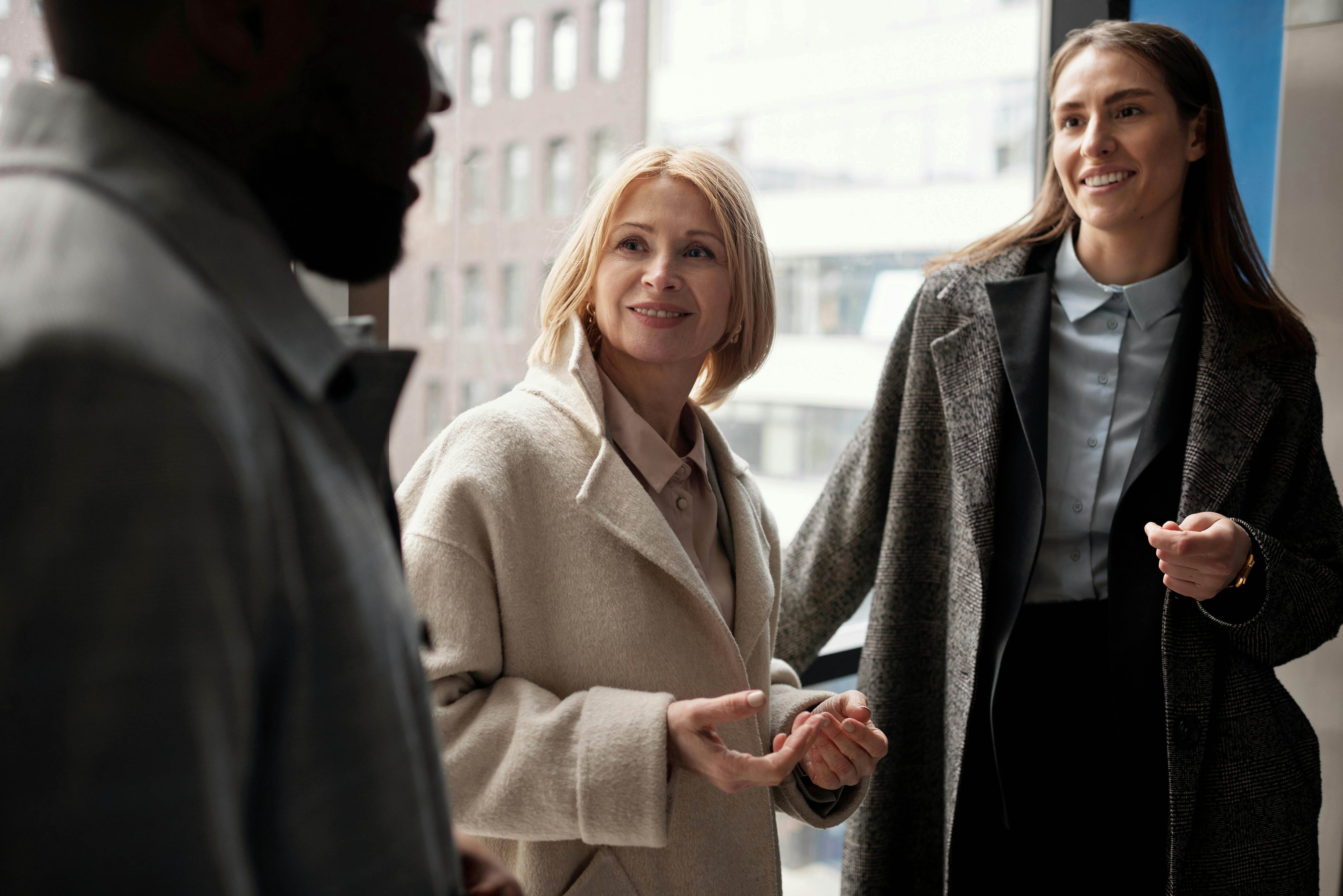 People talking outside an office building