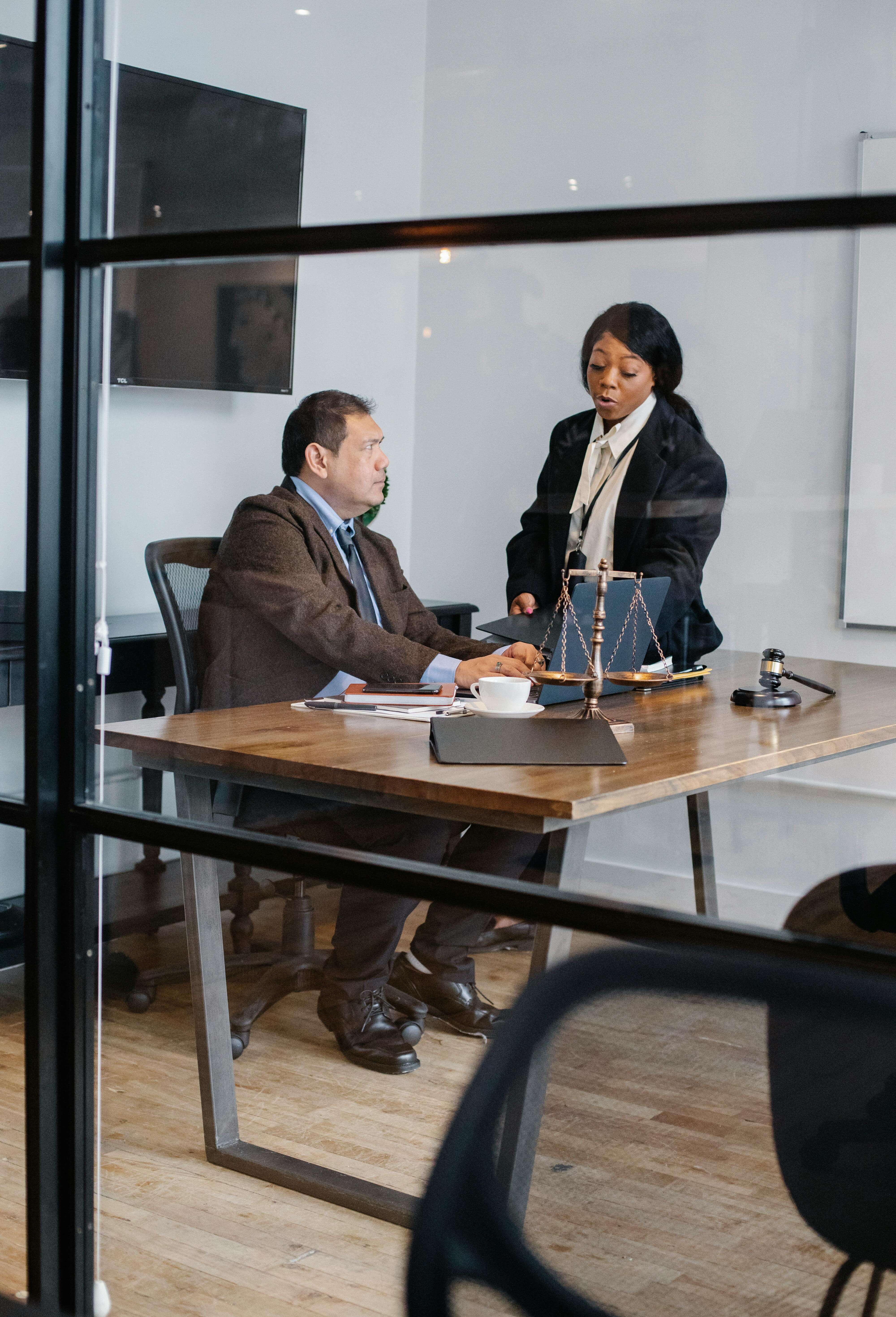 Lawyer meeting with a client in a law office