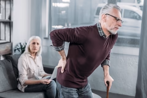 Leaning forward is one of the spinal stenosis symptoms.
