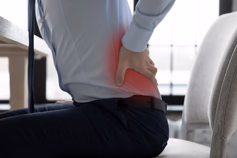 Poor posture can cause a stiff back.