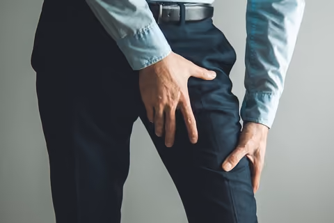 The muscle tightness around your thighs can cause a stiff back.