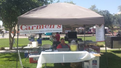 A picture of Carmen at her first ever festival event selling tacos, burritos, tea, and lemondade