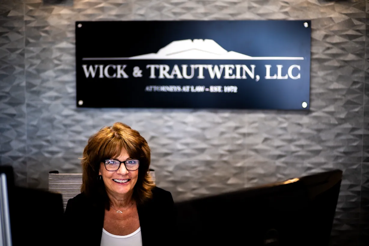 Wick & Trautwein attorney reviewing case materials