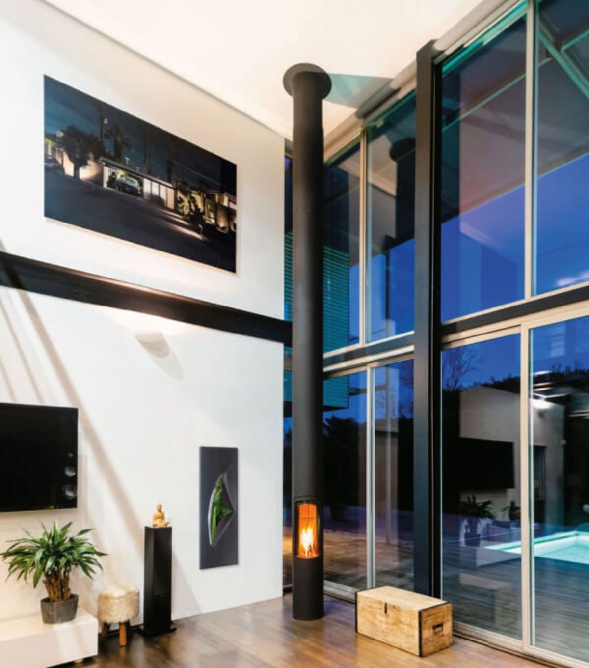 Tall slimfocus gas fireplace in the corner of a lounge