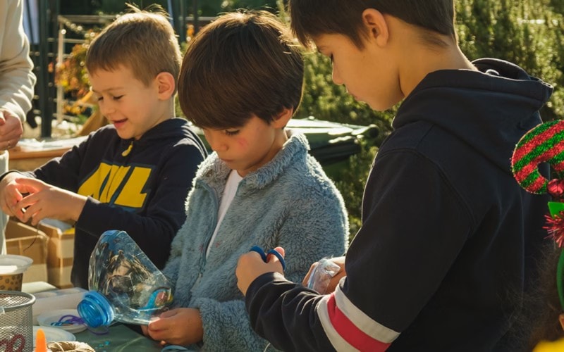 Children making a creative project together at Dukley