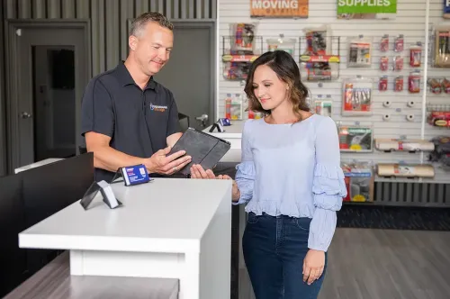 Guardian garage employee presenting to customer