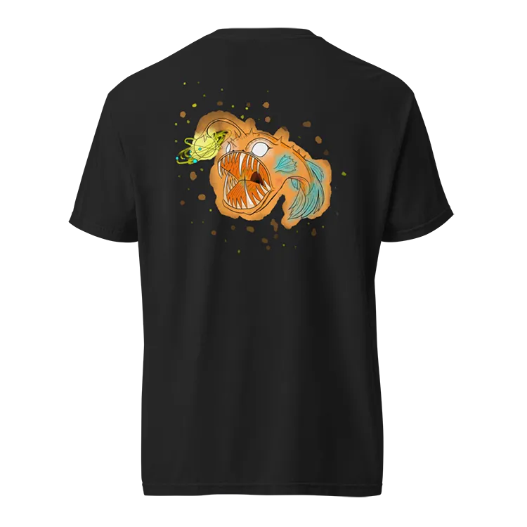 A t-shirt mockup of an anglerfish with a galaxy revolving around the light.