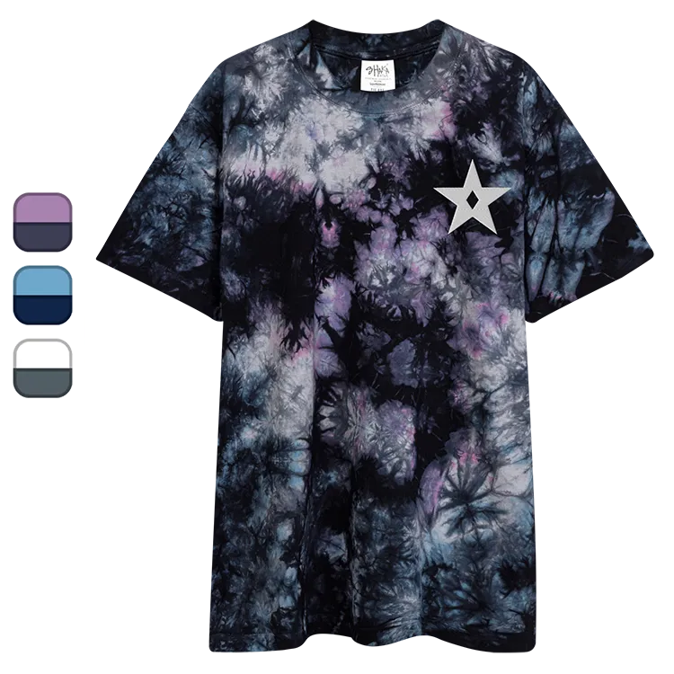 A tie dye t-shirt with the Atomic Liberation star icon embroidered onto it.