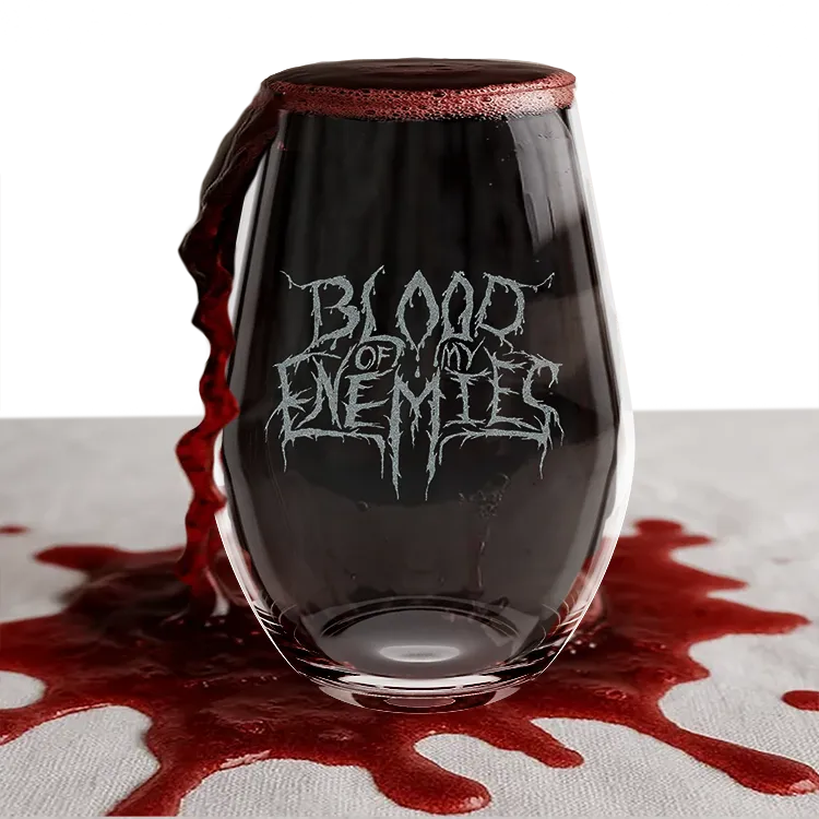 A wine glass that says blood of my enemies.