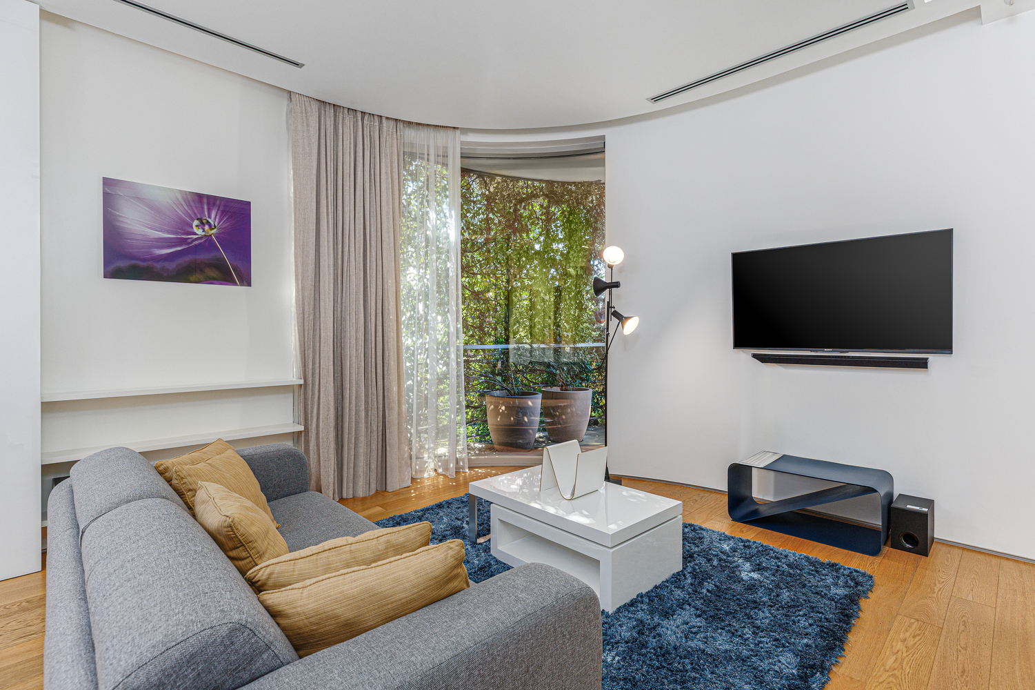 Interior of the one-bedroom residence with garden view at Dukley Hotel & Resort in Budva.