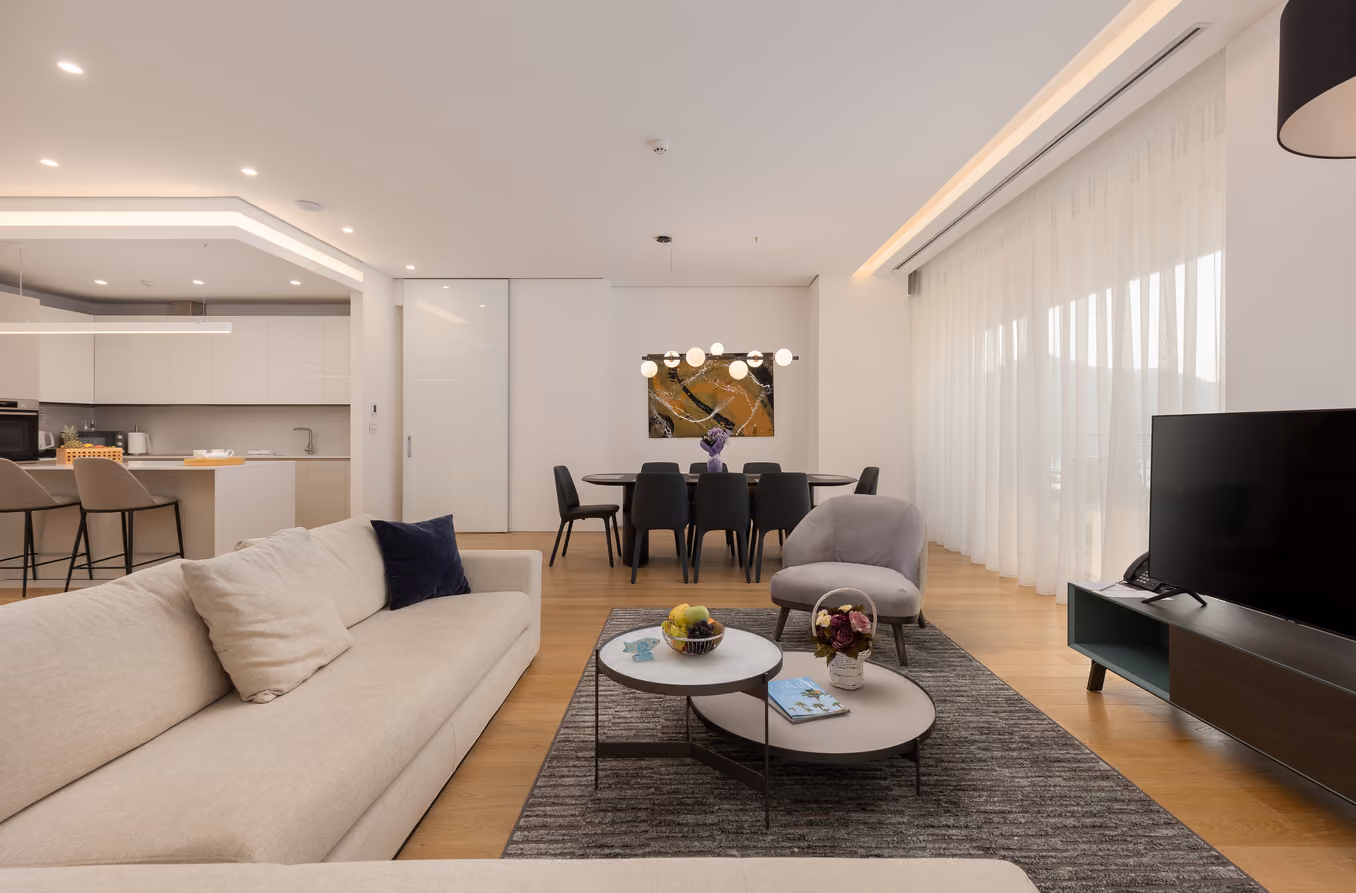 Four-bedroom penthouse at Dukley in Budva, perfect accommodation for larger families or groups of friends, equipped with luxury amenities including two terraces and outdoor hot tub.