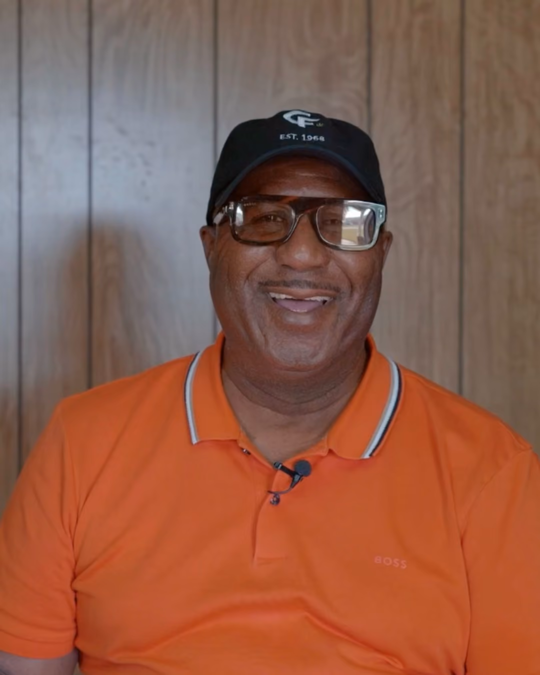 Abraham Carpenter Jr., CEO of Carpenter Farms, wearing branded "Est. 1968" cap at the family's medical marijuana cultivation facility in Grady, Arkansas.