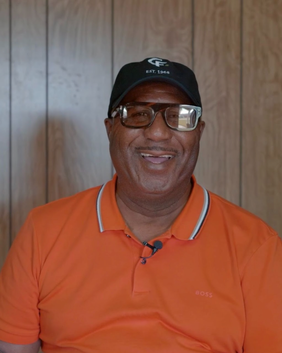 Abraham Carpenter Jr., CEO of Carpenter Farms, wearing branded "Est. 1968" cap at the family's medical marijuana cultivation facility in Grady, Arkansas.
