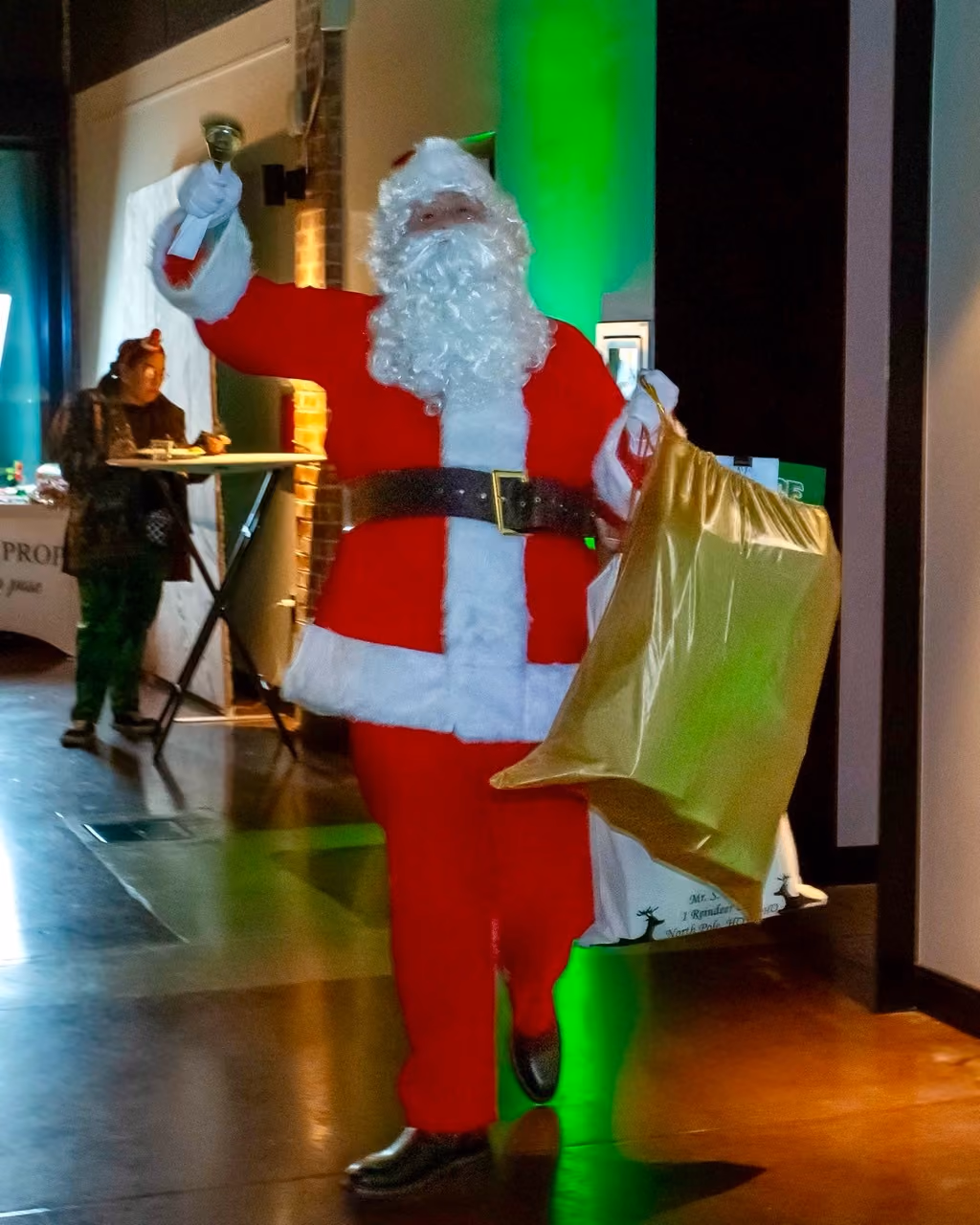 The Source badass budtender Garrick dressed as Santa Claus at dispensary employee holiday party.